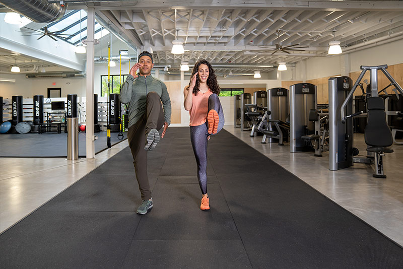 Trainer Joe warming up before a workout with a client